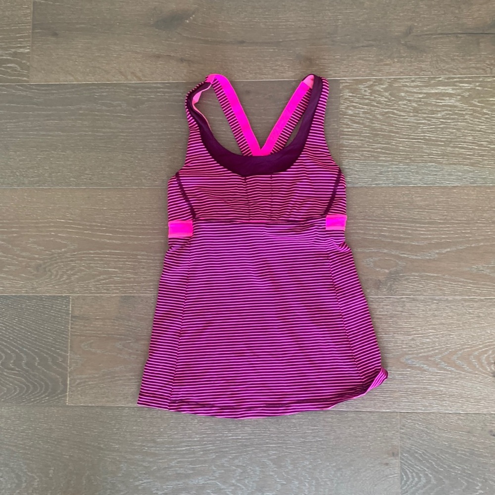 Lululemon workout tank. Was a gift but bot quite my color